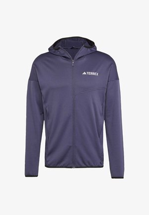 Marineblaue Reißverschlussjacke aus leichtem Stoff mit einem hexagonalen Muster, ausgestattet mit einer Kapuze und einer kleinen Brusttasche mit einem Logo.