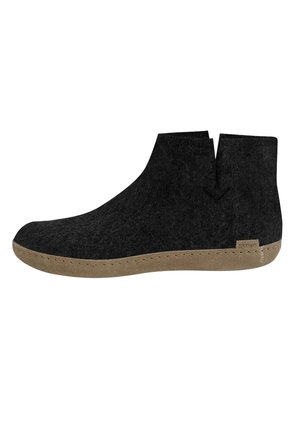 Black ankle-high felt shoe with light brown sole and small side tag with brand name "glerups" visible on white background.