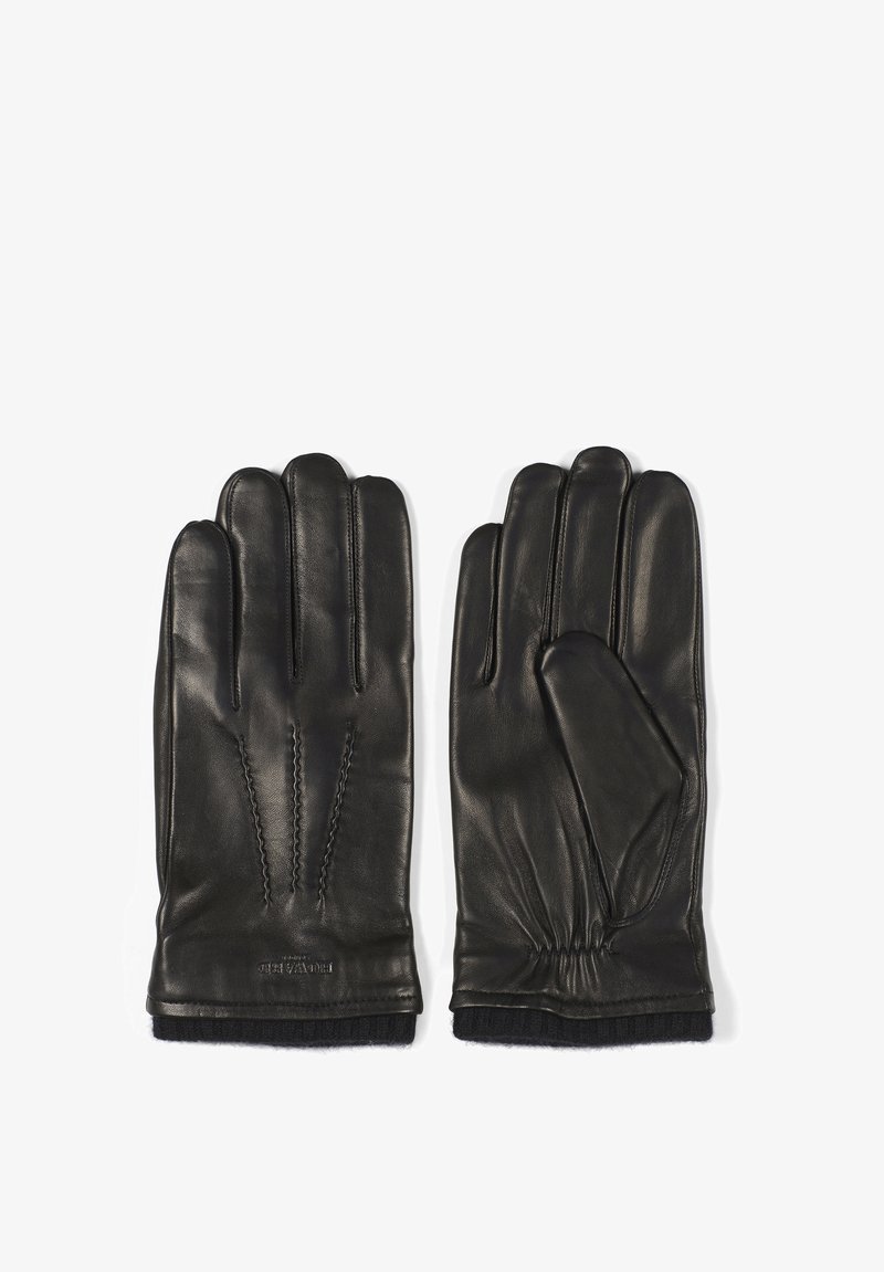 Sorte skinnhansker med en glatt finish, med fremtredende sømmer og strikket mansjett. Designet for varme og godt grep.