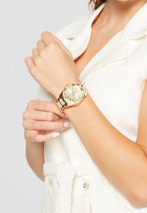 Montre - gold-coloured