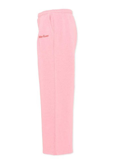 Pink sweatpants with elastic waistband, side pockets, and red "Bobo Choses" logo embroidered near the pocket.