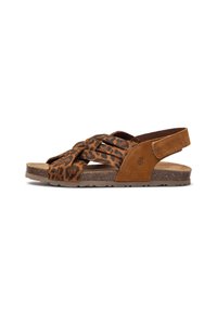 Sandaal met luipaardprint, voorzien van bruine suede banden met kruislings ontwerp, verstelbare achterband en getextureerde kurken zool.