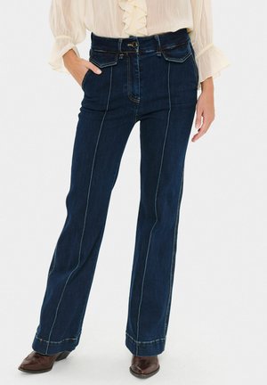 Vaqueros a campana - dark blue denim