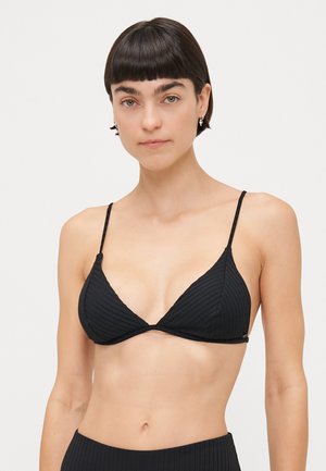 Black ribbed bikini top with triangular cups, thin adjustable straps, and a thin band under the bust. Subtle texture and minimal branding detail.