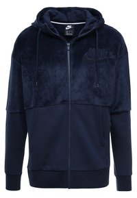 Marinblå hoodie med dragkedja, med ett mjukt, plysch övre panel och en jerseydel nedtill, justerbar dragsko på huvan och sidofickor.