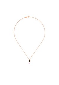 Collar de cadena de oro rosa con un pequeño colgante negro que presenta un acento rosa. Diseño simple, ligero y con una textura delicada.