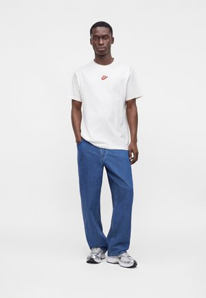 Nike SB, LOOSE PANT UNISEX - Avar lõikega teksad - french blue