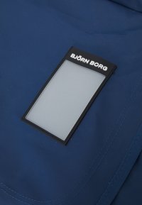 Björn Borg DUFFLE BAG 55L UNISEX - Športna torba - blue wing teal