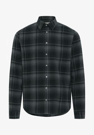 Mustreeritud must-valge särk, valmistatud pehmest kangast, pikad varrukad, klassikaline krae ja ümaral serval. Ees kuus nööpi.