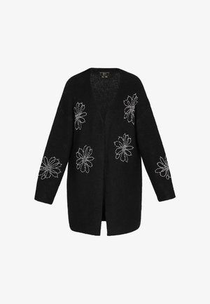 Juodas megztas kardiganas su atviru priekiu, pabrėžtas baltomis gėlėmis, dekoruotomis mažais apdailos elementais. Ilgos rankovės, laisvas siluetas.