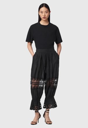 Poradie 3: AllSaints - SOLENE TROUSERS . - Nohavice