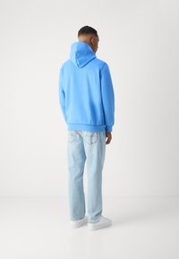 Tommy Hilfiger ESSENTIAL HOODY - Džemperis su gobtuvu - blue spell