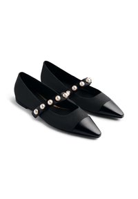 Black pointed-toe Mary Jane flats with pearl-studded straps and matte finish, displayed on a white background.