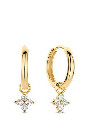 Gold hoop earrings featuring a dangling charm with four round, sparkling stones. Smooth finish and polished texture enhance their elegance.