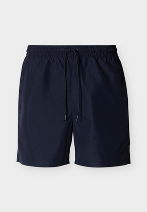 Μπλε ναυτικό ανδρικό μαγιό σορτς με ελαστική μέση και κορδόνι, μήκος μέχρι το γόνατο, ελαφρύ ύφασμα, χωρίς εμφανή λογότυπα ή σχέδια.