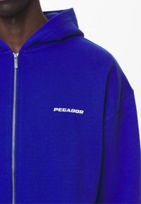 Pegador LOGO OVERSIZED JACKET - Sweatjakke - washed endless blue
