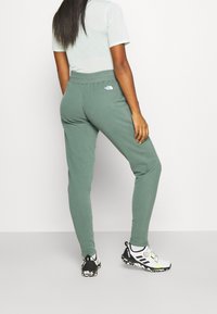 The North Face Tracksuit bottoms - green