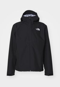 Veste noire imperméable avec capuche ajustée, fermeture éclair frontale et logo sur le côté gauche de la poitrine. Doublure douce et poignets ajustables complètent le design.