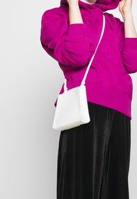 Nike Sportswear Mikina s kapucí - pink