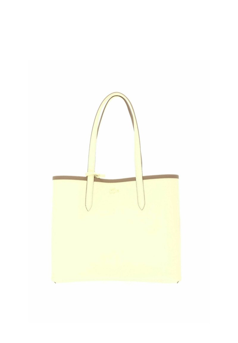 borsa tote in pelle color crema con due manici lunghi e bordatura marrone lungo il bordo superiore, senza decorazioni o tasche visibili