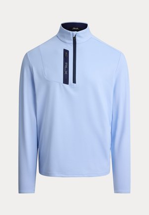 Svetlomodrý pulóver s polovičným zipsom na golieri, dlhými rukávmi a vreckom na zips s tmavomodrým detailom. Jemná, ľahká tkanina.