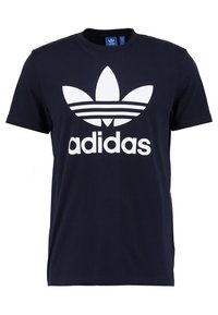 Tmavě modré bavlněné tričko s velkým bílým logem Adidas trefoil a názvem značky bílými písmeny pod logem, s kulatým výstřihem.