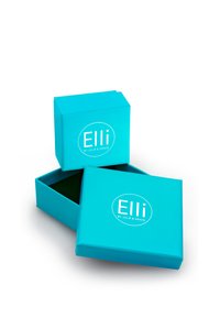 Des boîtes cadeau turquoise, dont l'une est partiellement ouverte, arborant le logo "Elli by Julie & Grace" sur le devant. Texture lisse, design carré.