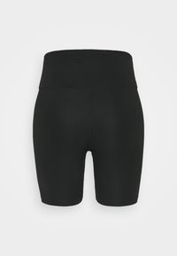Short cycliste noir taille haute et extensible avec coutures visibles, affiché sur un fond clair uni.