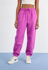 Nike Sportswear PANT  - Treniņtērpa apakšdaļas - hot fuchsia