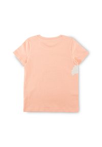 Short-sleeve t-shirt in light peach cotton, featuring a white abstract accent on the back, with a classic crew neck design.