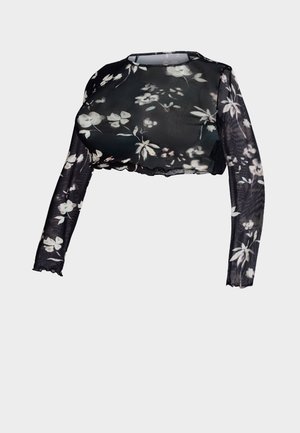 Μαύρο μακρυμάνικο cropped τοπ από διάφανο ύφασμα με λουλουδάτο μοτίβο σε λευκό και ανοιχτό γκρι. Λεπτομέρεια με κυματιστό τελείωμα στο κάτω μέρος.