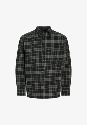 Camisa de cuadros en blanco y negro con mangas largas, cuello abotonado y bolsillo frontal, fabricada con un tejido suave y texturizado.