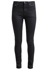 Svarta smala jeans med hög midja, tillverkade av denimtyg. Har fem fickor och dragkedja med knappstängning. Slät textur.