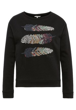 Musta pitkähihainen collegepaita, jossa edessä kolme vaakasuoraan kohdistettua, moniväristä kirjailtua höyhenkuviota.