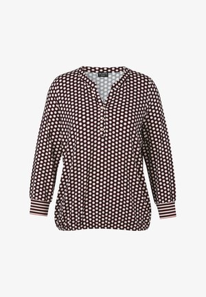 Black long-sleeve blouse with white polka dots, three buttons at the neckline, and striped cuffs.