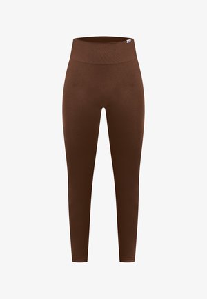 Leggings bruns avec une taille haute, fabriqués en tissu lisse et extensible. Conçus pour une silhouette ajustée sans coutures ni motifs visibles.