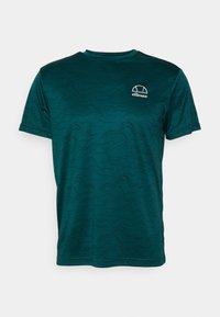 Krótki rękaw teksturowana koszulka w ciemnym odcieniu teal, z wzorem fal i białym logo na piersi. Wykonana z oddychającej tkaniny.