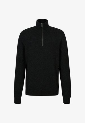 Pull-over noir en tricot avec un col à demi-fermeture éclair, des manches longues et des poignets côtelés. Fabriqué à partir d'un tissu doux avec une finition texturée.