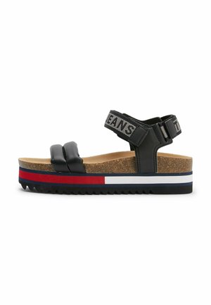 Sandali platform neri con due cinturini frontali, cinturino alla caviglia regolabile, footbed in sughero e suola testurizzata multicolore.