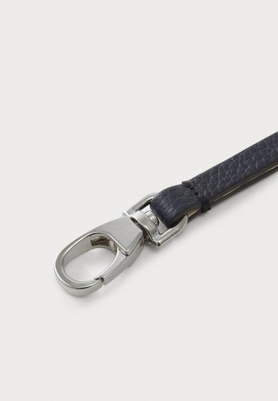 Navy leather strap with a textured finish, featuring a shiny silver metal clip and hardware for secure attachment.