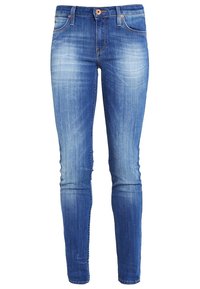 Slim jeans i medelblå denim med en blekt tvätt, framknapppning, fem fickor och en lätt stretch för komfort.