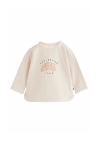 Chemise bébé à manches longues avec rayures crème et blanches, illustration souriante d'un croissant et texte « club croissant » sur le devant.