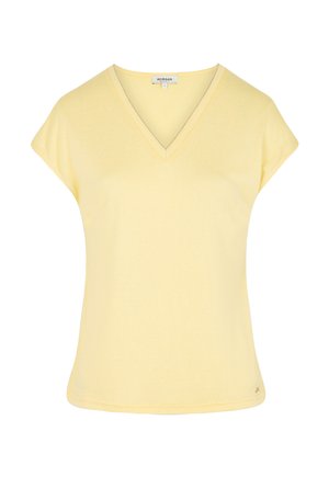 Haut pour femmes à manches courtes de couleur jaune clair avec col en V et petite étiquette de marque au niveau du cou, design uni et coupe décontractée.
