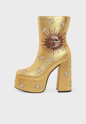 Koi Footwear, ECLIPSE STAR & SUN PLATFORM BOOTS - Bottines compensées - gold