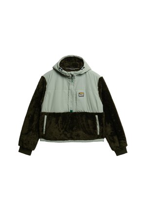 Hooded jacket with a light gray upper and dark brown faux fur lower sleeves and bottom. Features front zipper and two side pockets.