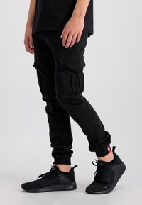 Alpha Industries TWILL JOGGER - Kapsáče - black