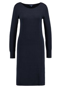 Navy blue knit dress, long sleeves, scoop neckline, fitted shape, textured fabric, reaching mid-calf, features subtle stitching details.