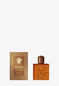 Versace Eros Najim voor heren geur, 50 ml amberkleurige glazen fles met een gestructureerd ontwerp, voorzien van een gouden Medusa-embleem en een bronzen dop. De doos is goud met een patroon.