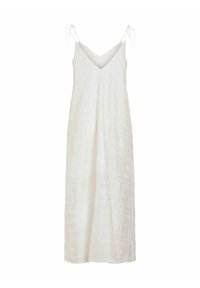 Robe maxi blanche sans manches avec col en V et fines bretelles nouées, avec des motifs brodés subtils sur un tissu léger.