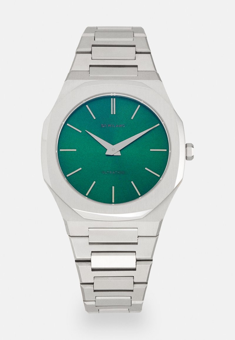 Stříbrné nerezové hodinky se zeleným přechodovým ciferníkem, minimalistický design, osmiúhelníkový pouzdro a stříbrné indexy hodin. Pevný řetízek.